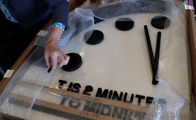Doomsday Clock Is Stuck At 2 Minutes To "Midnight," Symbolic Hour Of Apocalypse