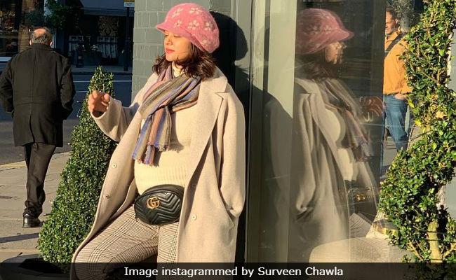 A New Pic Of Pregnant Surveen Chawla 'Basking Under The Winter Sun.' Seen Yet?