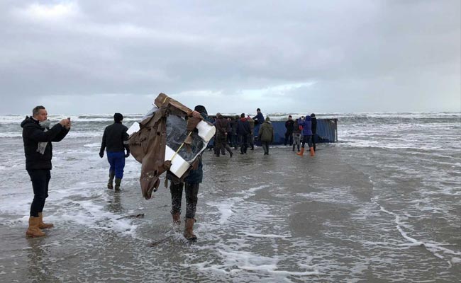 Flat-screen TVs, Car Parts Wash Ashore As Cargo Ship Containers Break