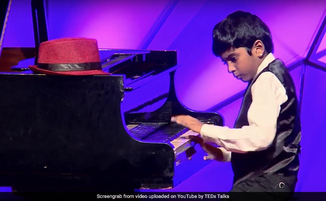 अमिताभ बच्चन ने शेयर किया इस सुपर टैलेंटेड बच्चे का Video, मशीन की तरह पियानों पर चल रही अंगुलियां