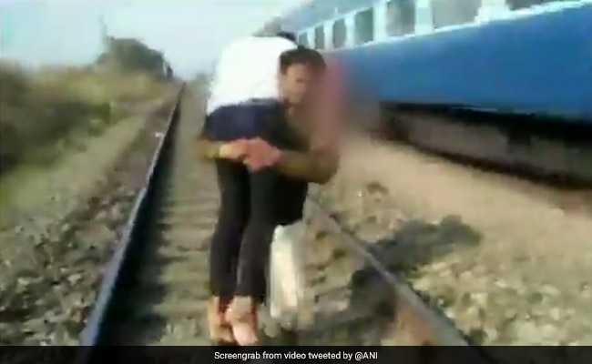 Watch: Carrying Injured Man, Madhya Pradesh Cop Runs On Rail Track