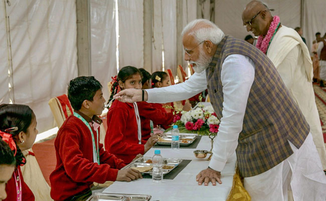 Watch: PM Modi, Yogi Adityanath Serve Food To Children In Vrindavan