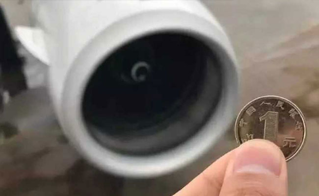 Chinese Passenger Throws Coin Into Plane's Engine For Good Luck - Again