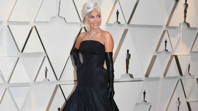lady gaga black dress oscars Lady Gaga's Sheer Corset Versace Dress at the Oscars 2023