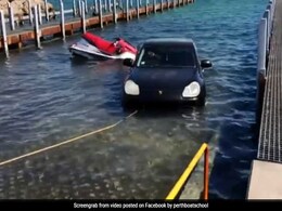 "Can't Buy Common Sense": Owner Trolled For Driving Porsche Into Ocean "Can't Buy Common Sense": Owner Trolled For Driving Porsche Into Ocean