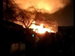 Fire In Delhi Slum Burns 250 Huts, Cooling Operations Underway Fire In Delhi Slum Burns 250 Huts, Cooling Operations Underway