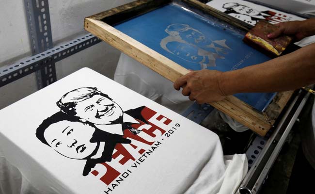 "Make Love Not War": Hanoi T-Shirt Designer Earns Bread From Trump-Kim Mania