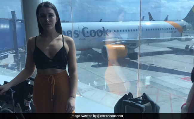 Woman Ordered To Cover Up "Offensive" Crop Top To Board Flight