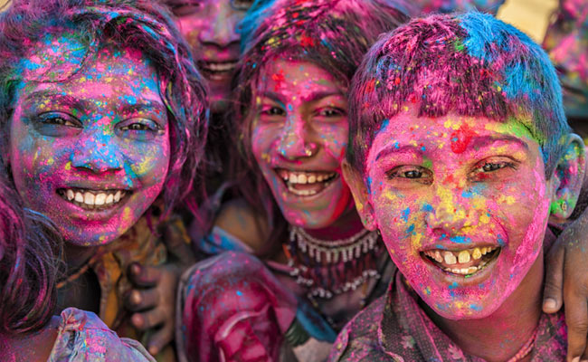 The dry gulal and the wet colours of today are not derived from natural sources.