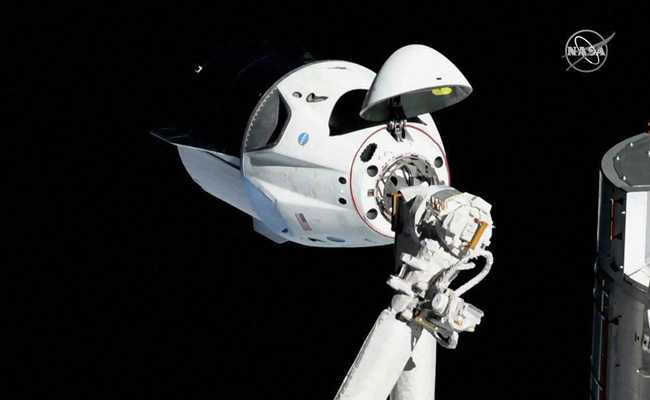 SpaceX's New Astronaut Capsule Docks On International Space Station