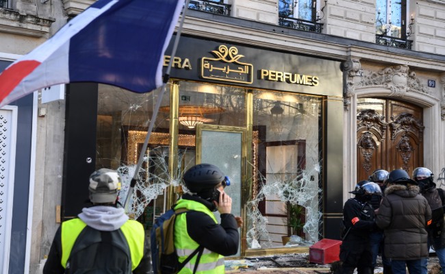 Paris Luxury Stores Looted, Burned In "Yellow Vest" Riots