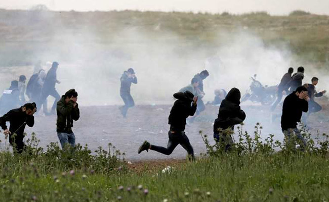 Four Palestinians Killed As Thousands Protest At Border, But Gaza-Israel Truce Holds