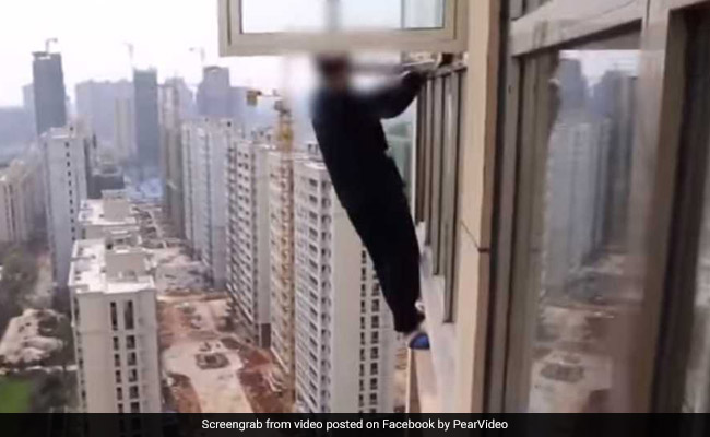 Watch: Man Climbs Out Of 23rd-Floor Window In Attempt To Escape Cops