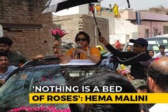 "No Bed Of Roses": BJP Candidate Hema Malini's SUV Sunroof Campaign "No Bed Of Roses": BJP Candidate Hema Malini's SUV Sunroof Campaign