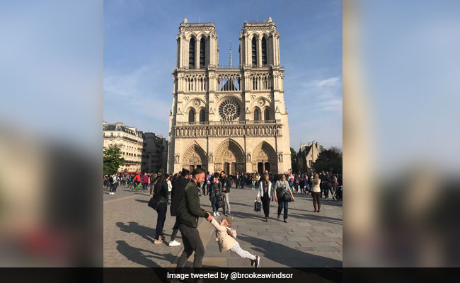 Twitter Helps Find Man, Girl Behind Happy Photo Outside Notre-Dame Paris