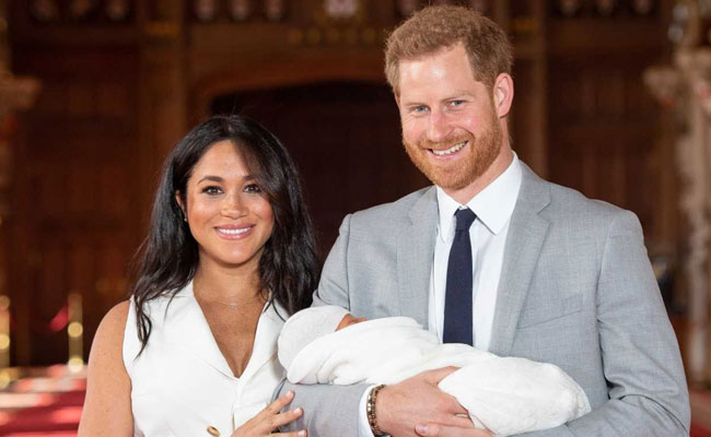 Prince Harry, Meghan Markle Show Off Their Baby Boy To The Public