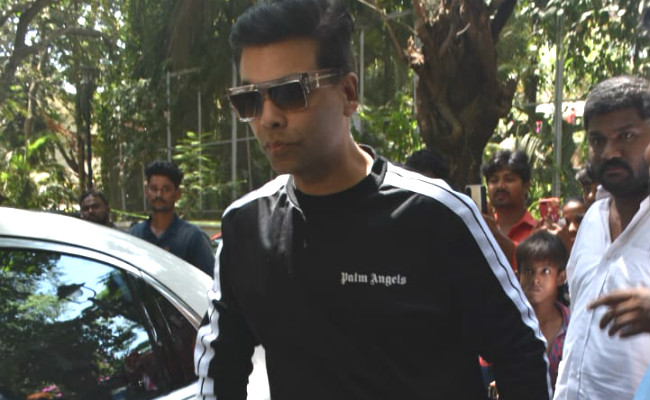 Karan Johar Shares His 'Cherished Memory' Of Veeru Devgan In Emotional Tweet