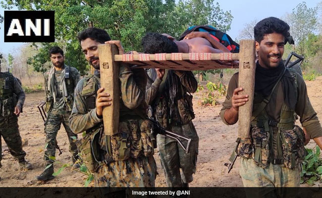 CRPF Soldiers Carry Injured Man On Cot To Hospital In Chhattisgarh
