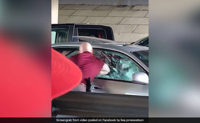 US Cop Defends Officer Seen On Video Bashing Car Window To Drag Man
