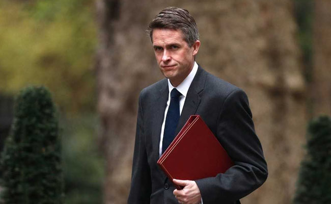 Theresa May Sacks Defence Minister Over Leak On Planned Huawei Contract