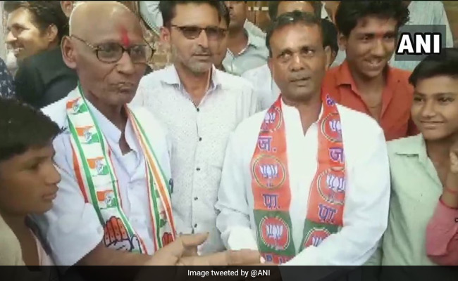 Congress Worker Loses Bet To BJP Worker, Gets His Head Shaved