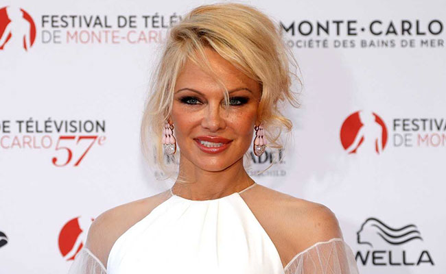 "I Love Him": Pamela Anderson Visits Julian Assange In Prison