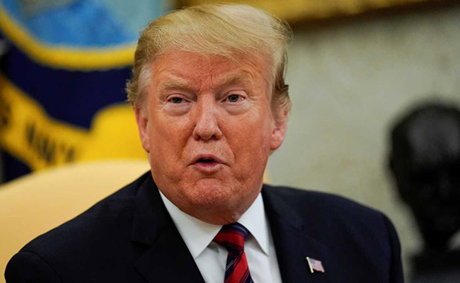 US Imposes Sanctions On Iran Metals, Tehran Eases Nuclear Deal Compliance