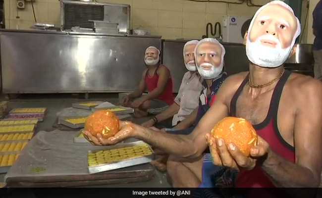 Men Wearing PM Modi Masks Prepare 2,000 Kg Laddoos Ahead Of Poll Results
