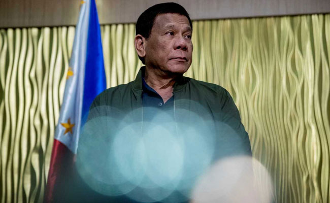 Philippine President Rodrigo Duterte Flicks Off Cockroach, Jokes It's Opposition's. Watch
