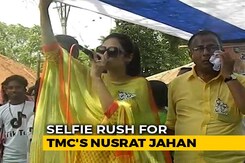 Selfie Rush With Trinamool's Nusrat Jahan Makes Stage Crash At Rally Selfie Rush With Trinamool's Nusrat Jahan Makes Stage Crash At Rally