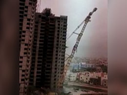 Cyclone Fani: In Video, 250-Foot Crane Crashes Onto Building In Odisha Cyclone Fani: In Video, 250-Foot Crane Crashes Onto Building In Odisha
