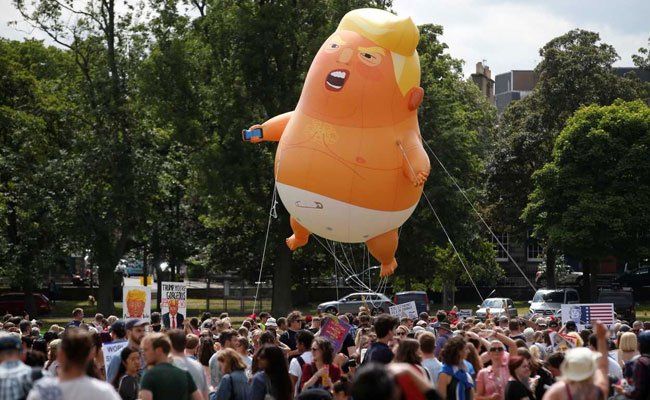 British Protesters Inflate Orange "Trump Baby" Blimp Ahead Of State Visit