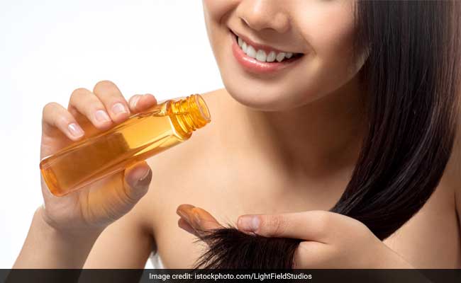 Coconut oil infused with tulsi stocks and goonja seeds can prevent dry hair during monsoon