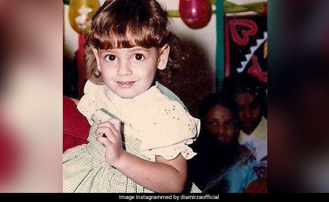 Can You Guess Who The 'Eighties Baby' In This Throwback Pic Is?