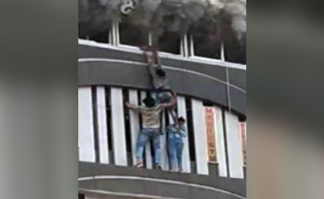 "True Hero": Surat Man Enters Burning Building To Save Trapped Students