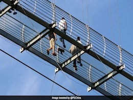 Don't Look Down! Tourists Brave World's Longest Glass Bridge In China Don't Look Down! Tourists Brave World's Longest Glass Bridge In China
