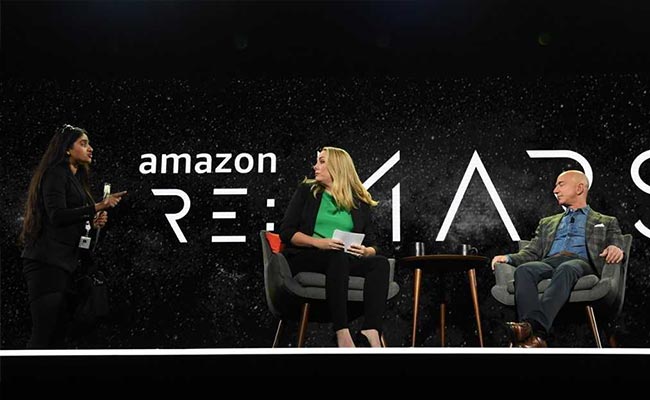 Indian-American Activist Storms On Stage, Shouts At Amazon CEO Jeff Bezos