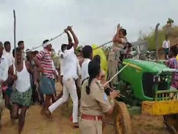 Telangana Officer, Thrashed By TRS Men, Charged For Assaulting Tribals Telangana Officer, Thrashed By TRS Men, Charged For Assaulting Tribals