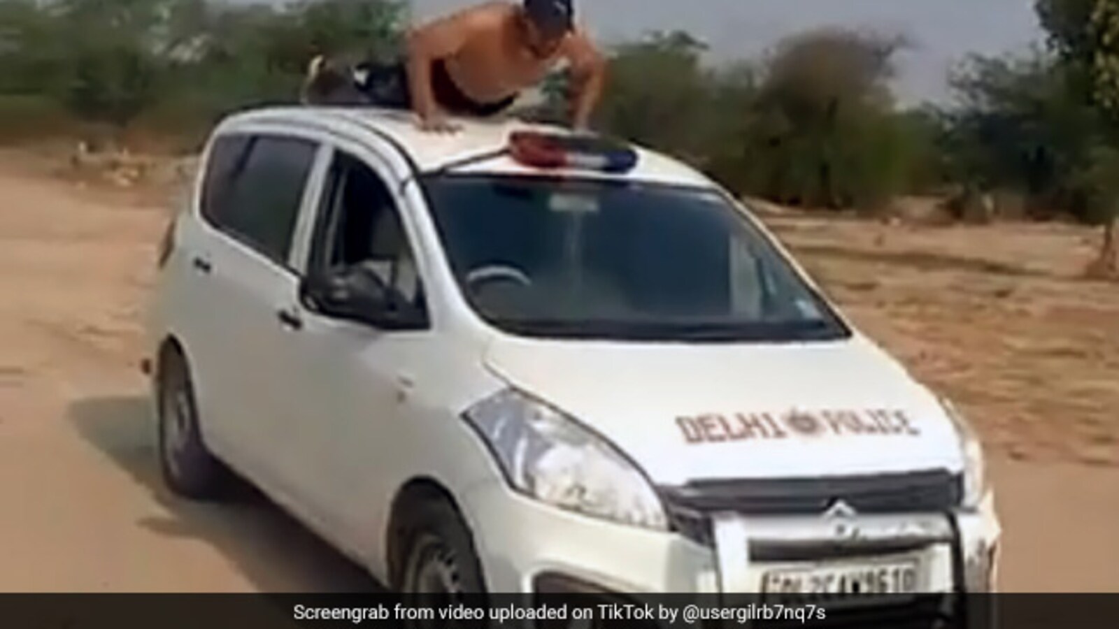 Delhi Police Car On Viral TikTok Video: On TikTok, Shirtless Man Does ...