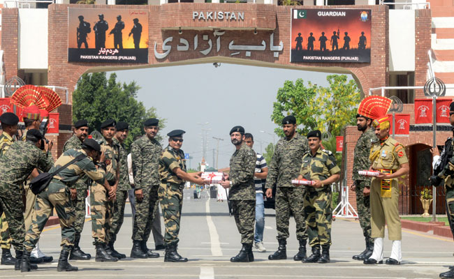BSF Soldiers, Pakistan Rangers Exchange Sweets On Eid