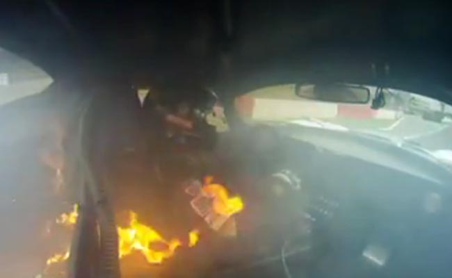 Watch: Car Engulfed In Flames As Driver Races Back To Fire Truck