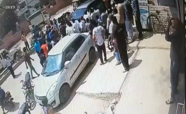 Homeguard Officer Dragged On BJP Leader's Car In Haryana