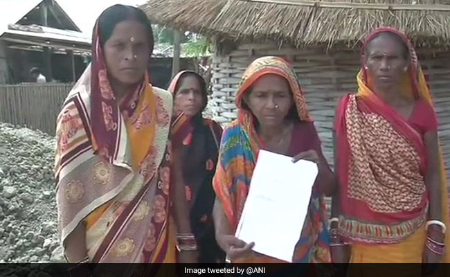 Parents Of Encephalitis Victims Among Those Charged For Blocking Road Over Deaths