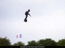"Flying Soldier" Soars Over Paris For Bastille Day Celebrations "Flying Soldier" Soars Over Paris For Bastille Day Celebrations