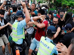 Hong Kong Protesters, Police Clash As Demonstrations Target Chinese Traders Hong Kong Protesters, Police Clash As Demonstrations Target Chinese Traders