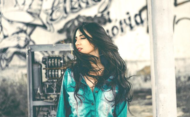 7 Chic Denim Tops Your Closet Needs Stat