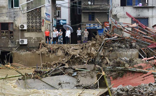 Heavy Rain, Floods In China Force Evacuation Of Nearly 80,000