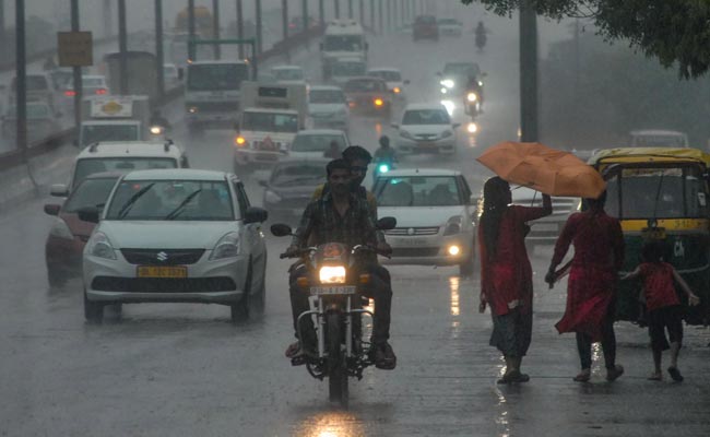 Delhi Witnesses Sudden Change In Weather; Rain Brings Respite From Heat