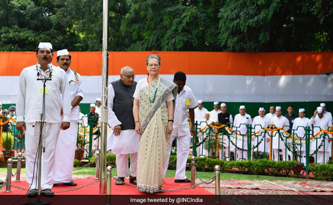 Sonia Gandhi Unfurls National Flag At Congress Headquarters