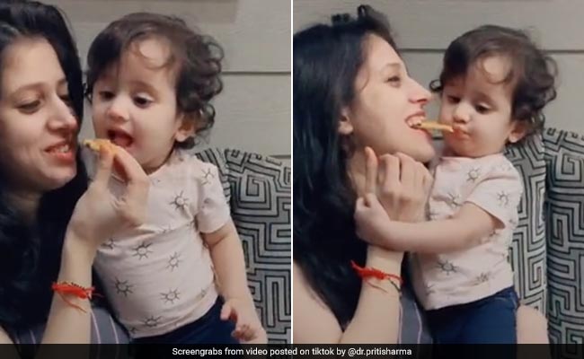 TikTok Top 10: पीजा खा रही थीं मम्मी, बच्चे ने ऐसे छीन लिया मुंह से, देखें VIDEO